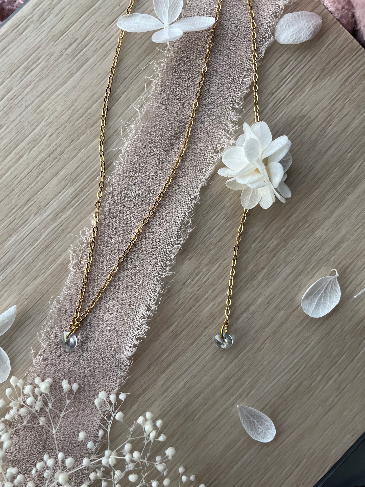 Collier de dos cristal